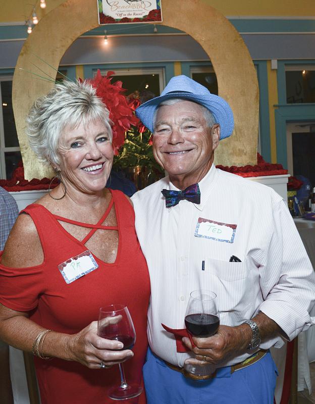 Pat and Ted Fischer pose in the winner’s circle.